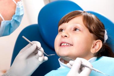 A girl getting a dental exam