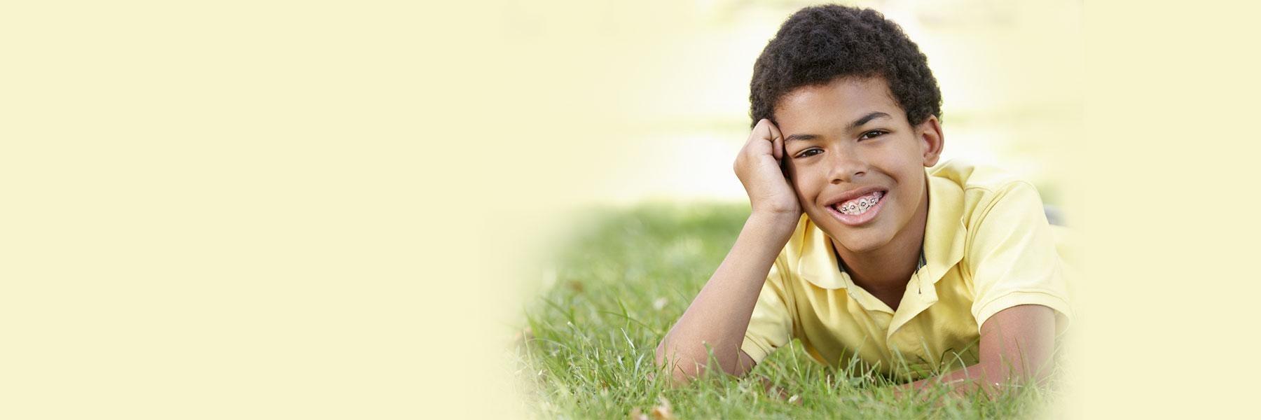 Young boy smiling after orthodontic work, Corona CA